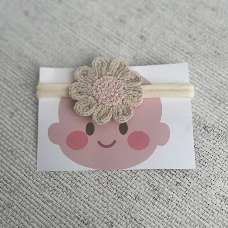 Headband with a crocheted flower