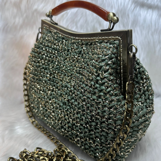 Crochet purse,  raffia and shimmering metallic yarn